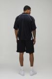 Pantalón corto con ribete bordado - NEGRO